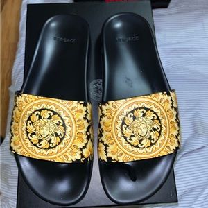 Authentic brand new in original box and dust bag Versace slides